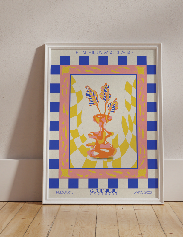 A framed poster featuring the Calla Lillies in a Glass Vase Wall Art in Capri on Good Juju Homewares.