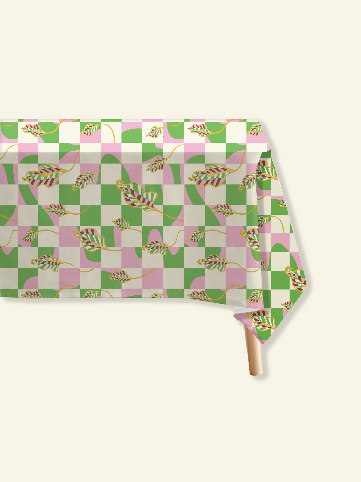 The Checkered Calla Lily Tablecloth by Good Juju Homeware in Melbourne is a stylish addition to any dining area, featuring a vibrant green and pink checkered pattern.