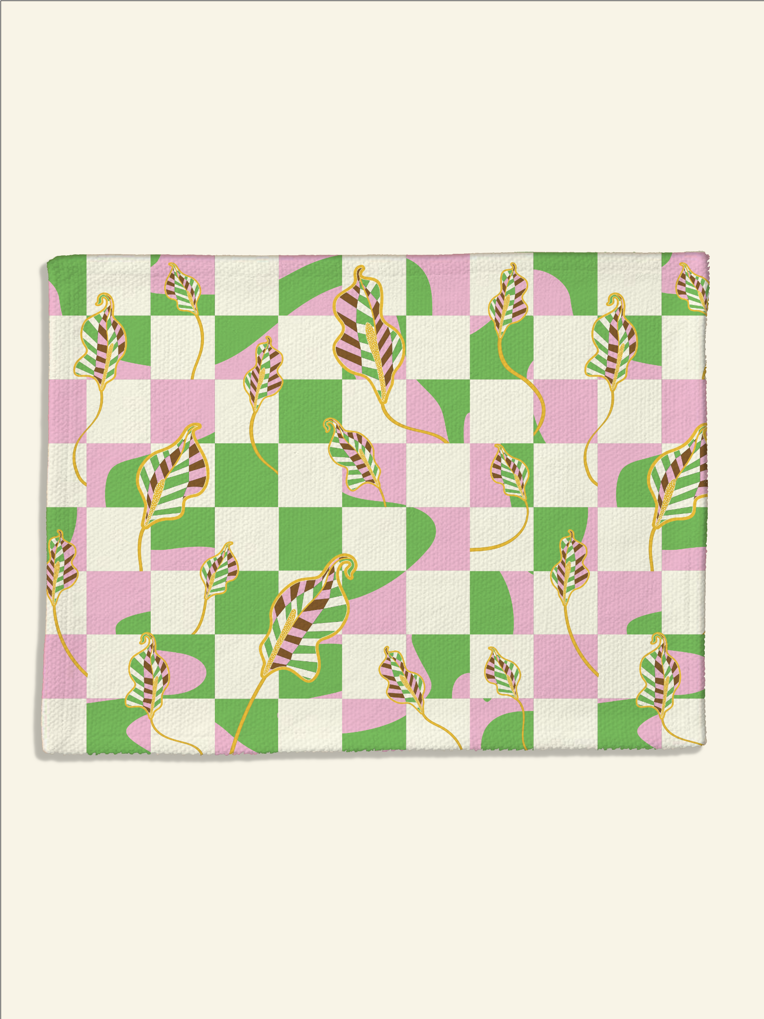 A pink and green Checkered Calla Lilly Placemat | Florence with leaves on it by Good Juju Homeware.