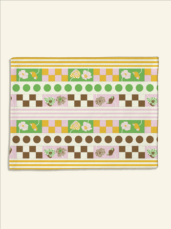 An organic cotton, green, brown, and yellow checkered Poppy Stripe Placemat by Florence perfect for Good Juju Homeware's tableware collection.