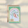 Illustration of a lemon tree with bright lemons in a pot, framed by an arch and "LEMON TREE" at the top—perfect as a Mediterranean greeting card or unique blank card from Good Juju Homeware.