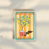 The Lemon Greeting Card by Good Juju Homeware features a lemon tree in a red pot on a striped background, with "ALBERO DI LIMONE" in red. Printed on premium card stock for a Mediterranean touch.