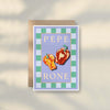 The Pesto Greeting Card by Good Juju Homeware features two illustrated bell peppers on a blue background with green and white check borders and playful “PEPE RONE” text—a fun birthday card for any celebration.