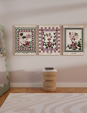 A room adorned with three Good Juju Homeware Poppies in a Glass Vase Wall Art | Venice pieces.