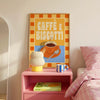 Room interior with a pink nightstand, 'Caffè e Biscotti' poster, and a bed.