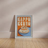 Framed poster with 'Cappuccino' text and coffee cup design on a beige wall.