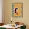 Colorful framed artwork of a fish on a wall above a dining table with decor items.